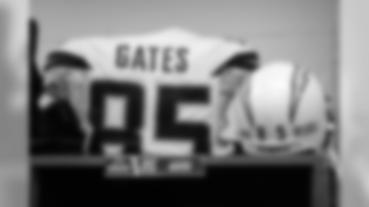 Antonio Gates' jersey and helmet sit in the locker room before the Wild Card matchup against the Baltimore Ravens at M&T Bank Stadium.