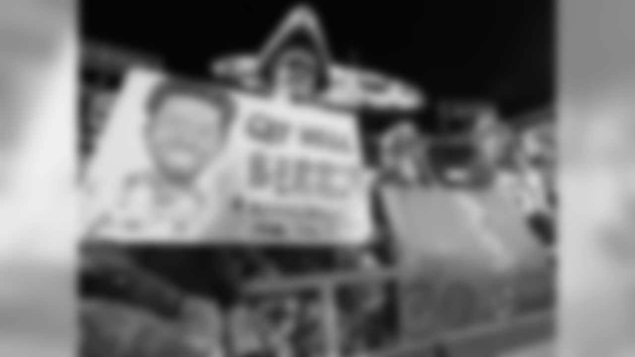 Photos of fans and players showing their support for Safety, Eric Berry