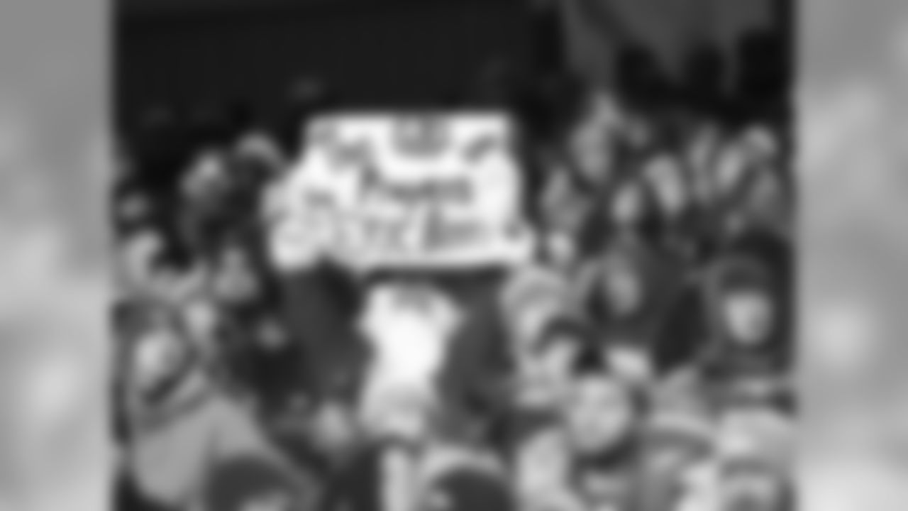 Photos of fans and players showing their support for Safety, Eric Berry
