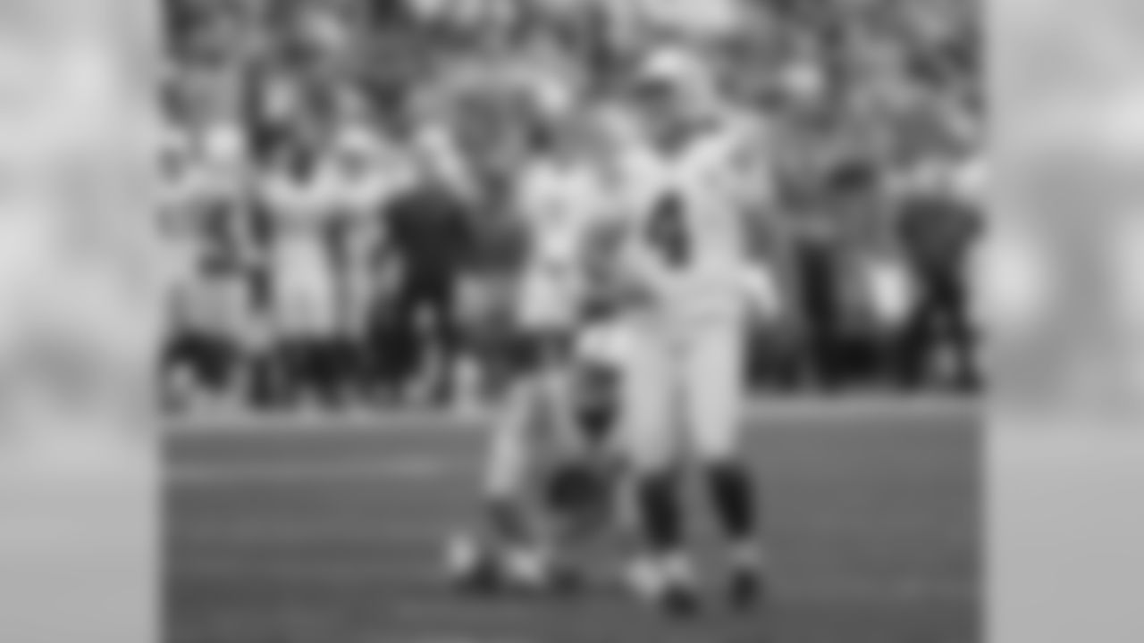 Indianapolis Colts kicker Adam Vinatieri (4) and holder Rigoberto Sanchez (2) look on after Vinatieri kicked a field goal against the Seattle Seahawks during the first half of an NFL football preseason game, Thursday, Aug. 9, 2018, in Seattle. (AP Photo/Elaine Thompson)