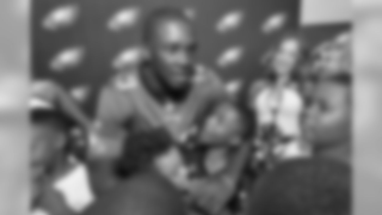 WR Nelson Agholor and the Eagles cheerleaders with an excited group of young football players