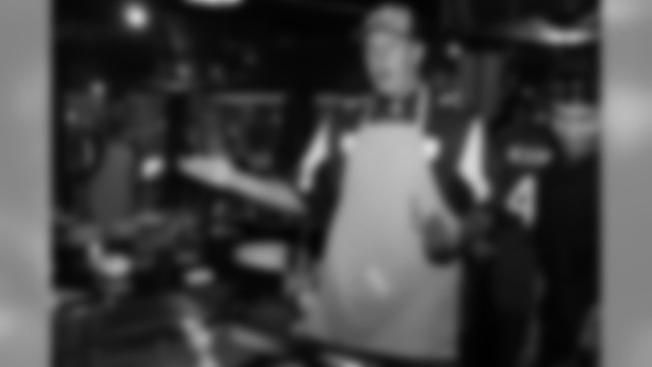 T Daniel Brunskill cooking at the dazzle and dine event