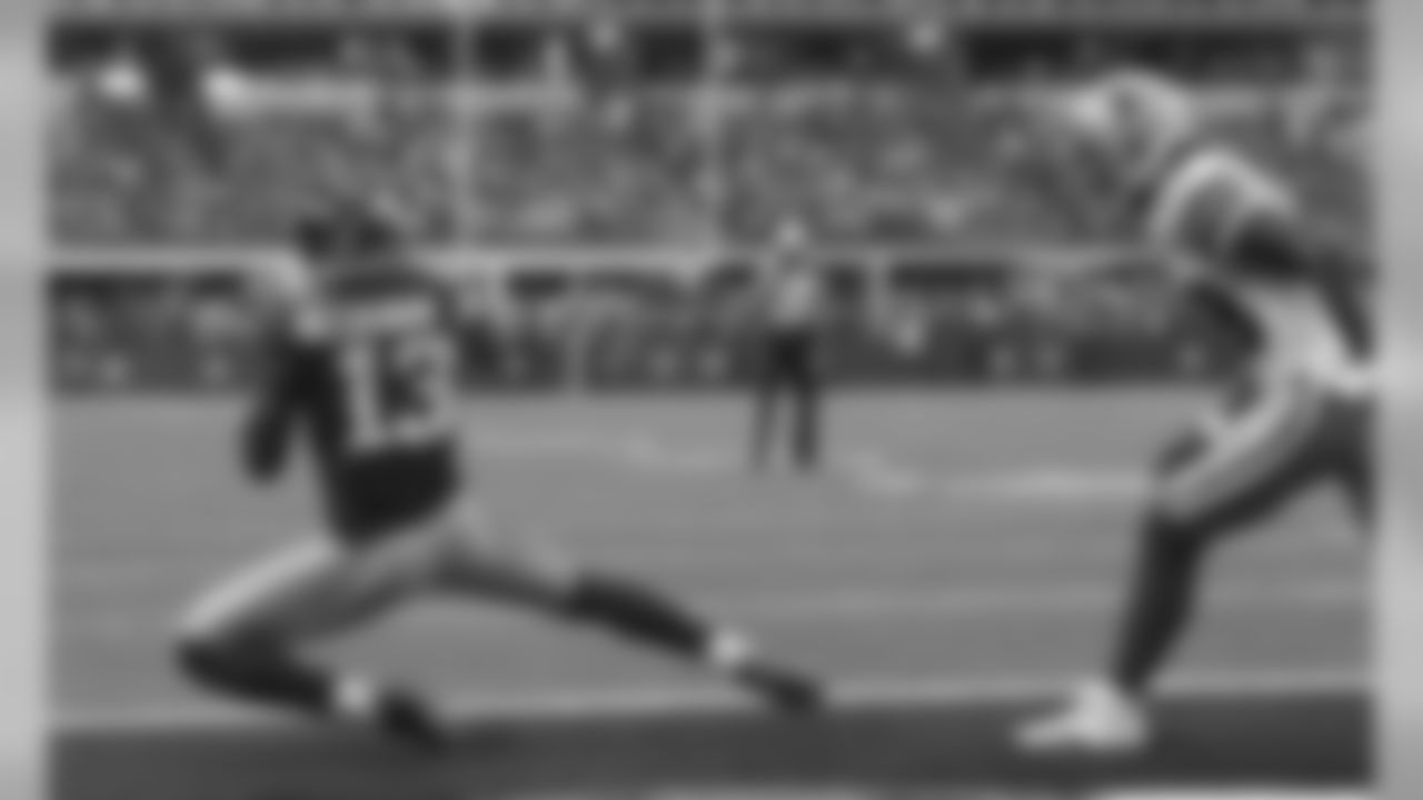 New York Giants wide receiver Odell Beckham (13) catches a touch down pass during the first half of an NFL football game, Sunday, Oct. 19, 2014, in Arlington, Texas. (AP Photo/LM Otero)