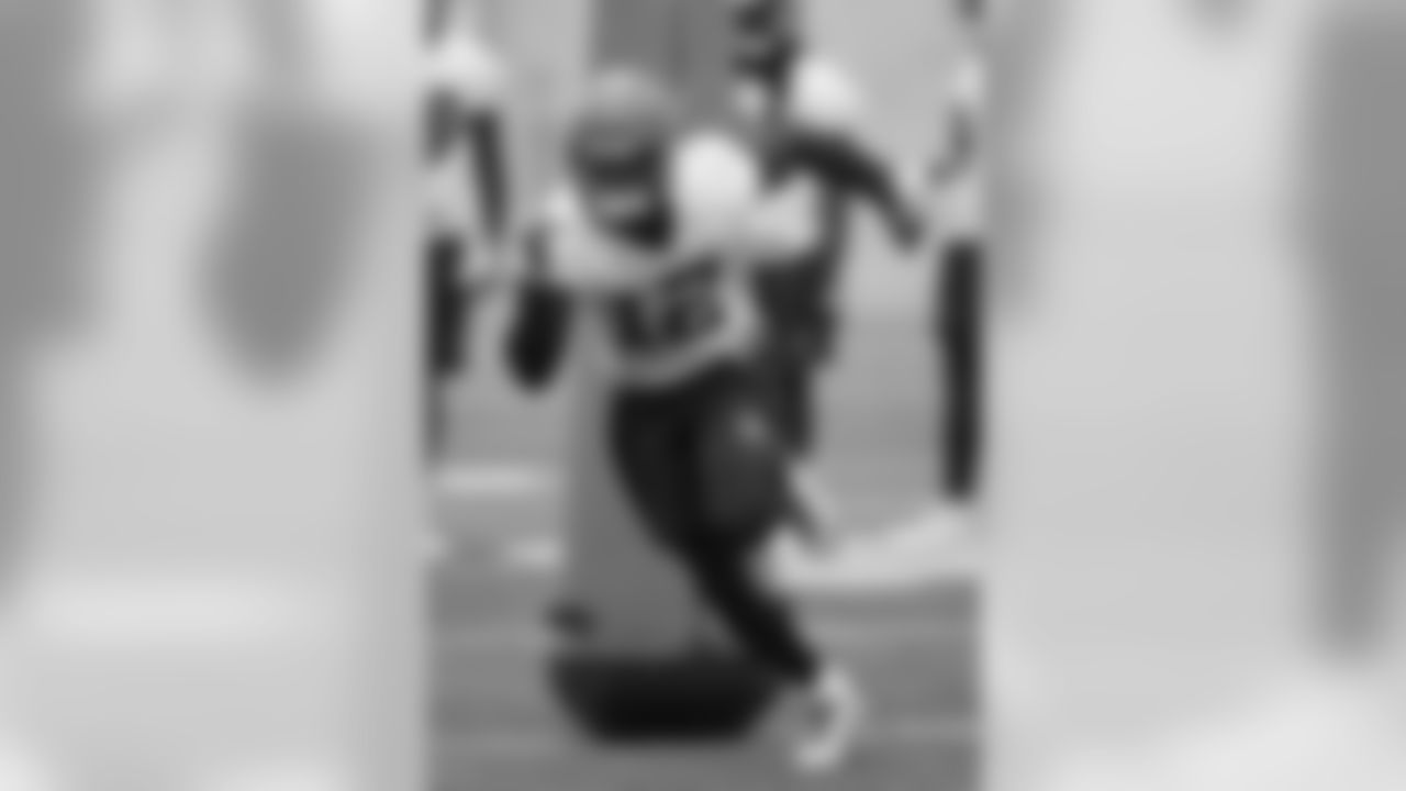 FILE - In this May 4, 2018, file photo, Cleveland Browns' Denzel Ward runs a drill during rookie minicamp at the NFL football team's training camp facility in Berea, Ohio. The Browns have signed Ward a day before opening training camp. Ward was the fourth player taken in this year’s draft and he is expected to start. (AP Photo/Tony Dejak, File)