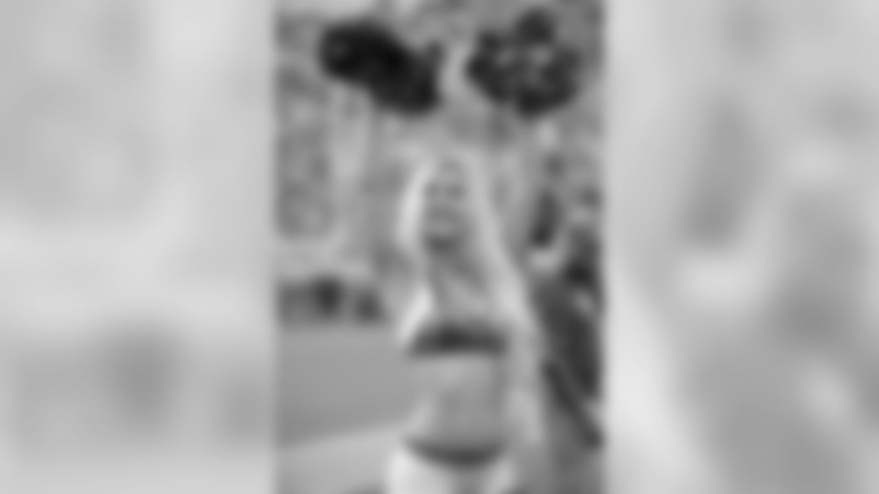 A Jacksonville Jaguars cheerleader performs during the first half of an NFL preseason football game against the Atlanta Falcons Saturday, Aug. 25, 2018, in Jacksonville, Fla. (AP Photo/Phelan M. Ebenhack)