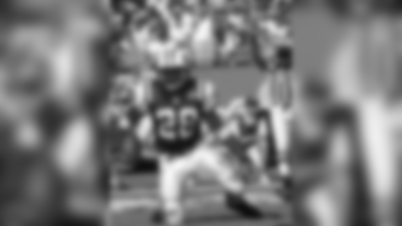 New York Jets' Curtis Martin kneels in the endzone after scoring a touchdown in the first quarter of their game against the Miami Dolphins, Sunday, Oct. 3, 2004 in Miami. (AP Photo/J. Pat Carter)