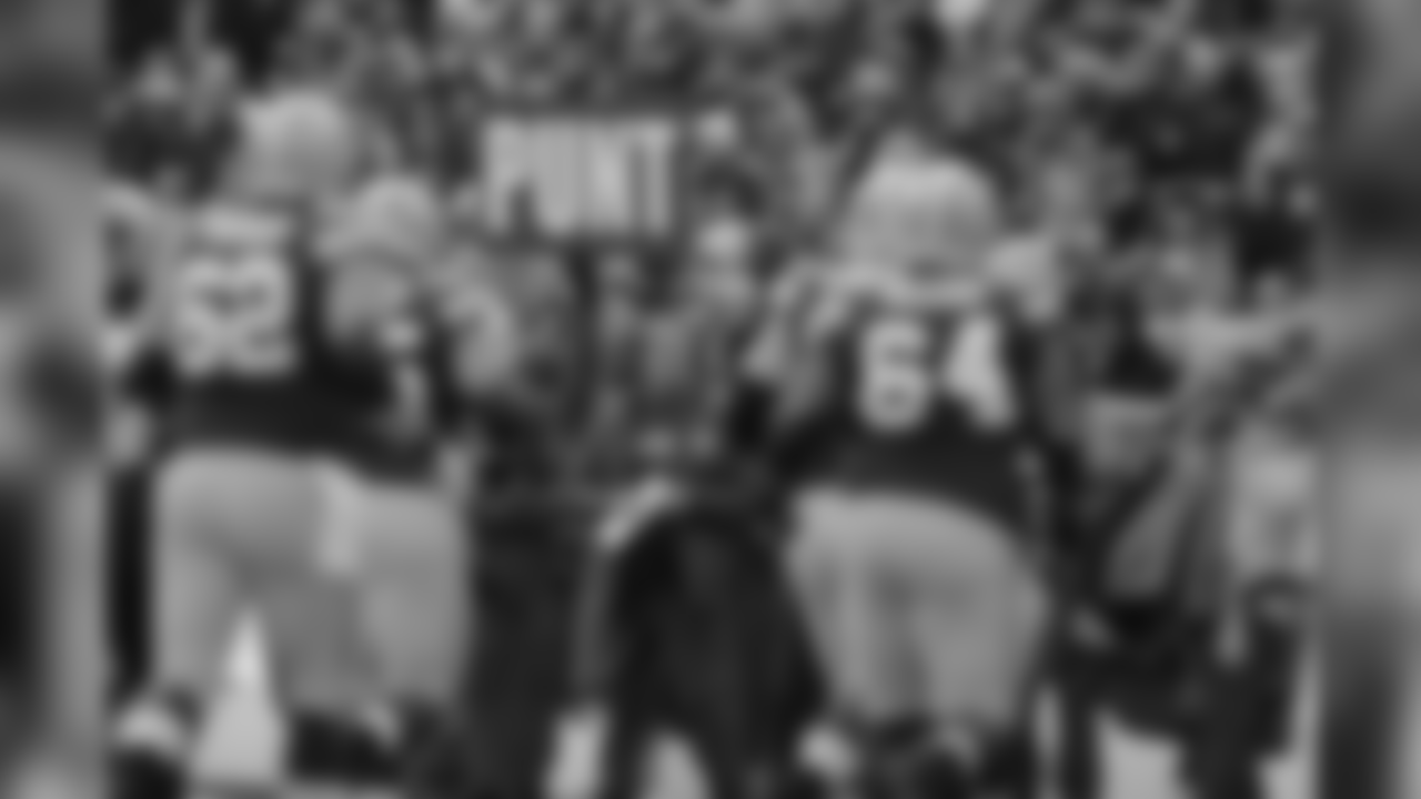 Green Bay Packers call for a punt during a NFL football game against the Detroit Lions on Sunday, Dec. 30, 2018 in Green Bay, Wisc. (Detroit Lions via AP).