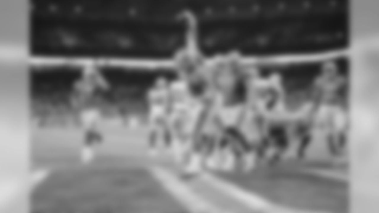 Detroit Lions offensive lineman Frank Ragnow (77) spikes the football in celebration after a rushing touchdown during a NFL football game against the Green Bay Packers on Sunday, Oct. 7, 2018 in Detroit. (Detroit Lions via AP).