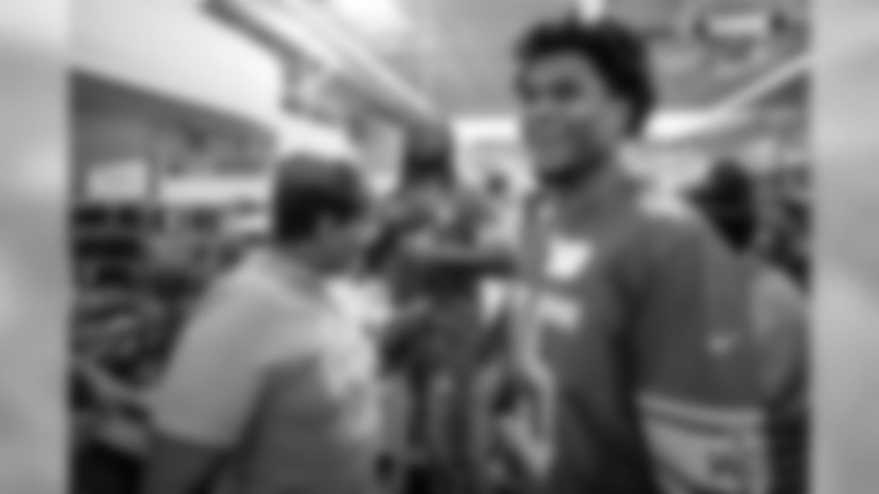 Detroit Lions running back LeGarrette Blount (29) and Detroit Lions safety Charles Washington (45) with students from Detroit Lions Academy at Shop with a Lion at Meijer on Tuesday, Dec. 4, 2018 in Detroit.