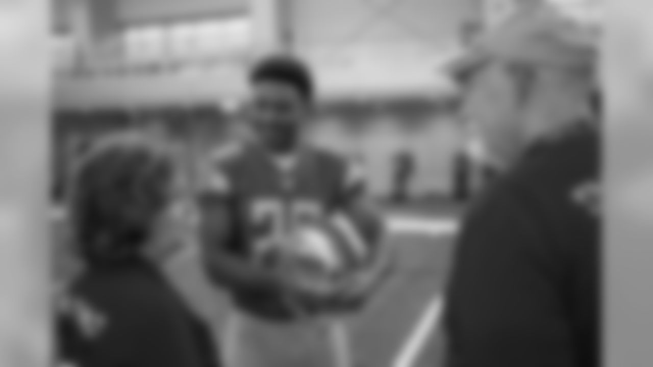 Detroit Lions cornerback DeShawn Shead (26) meets with families from Tragedy Assistance Program For Survivors (TAPS) after the team's walkthrough at the Detroit Lions training facility on Saturday, Nov. 17, 2018 in Allen Park, Mich. (Detroit Lions via AP)