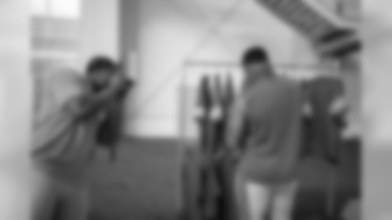 Detroit Lions defensive end Romeo Okwara takes a photo of Detroit Lions defensive lineman Da'Shawn Hand at media day on Monday, June 3, 2019 in Allen Park, Mich.