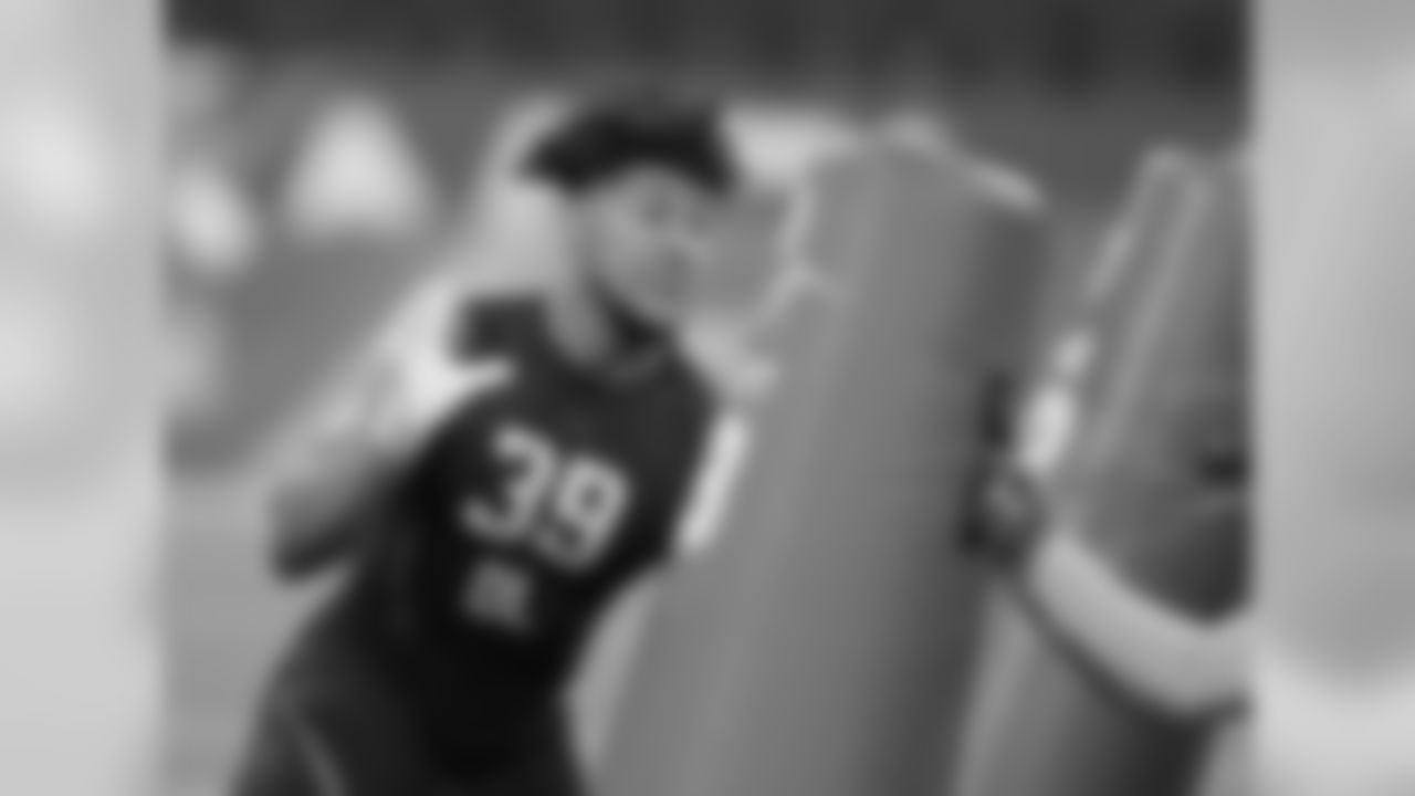 View photos of NFL prospect Harold Landry.