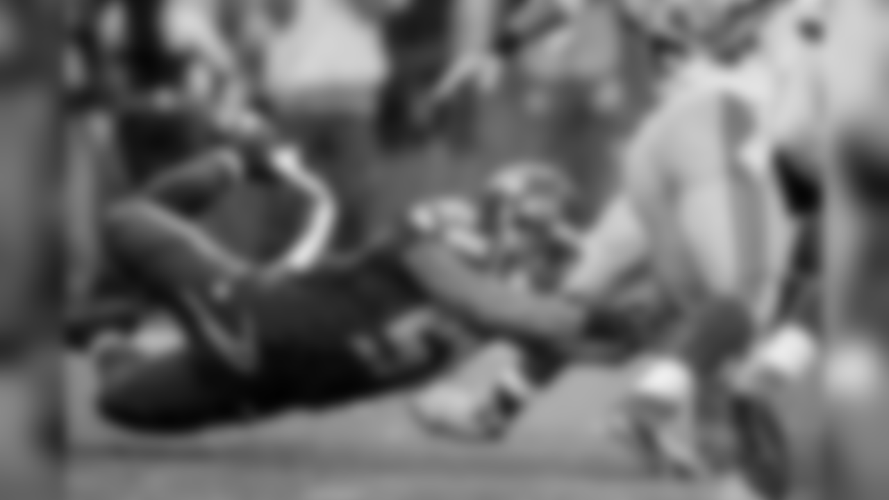 Seattle Seahawks outside linebacker Bruce Irvin tackles New York Giants running back Andre Williams for a 2-yard loss in the second half of an NFL football game, Sunday, Nov. 9, 2014, in Seattle. (AP Photo/Scott Eklund)