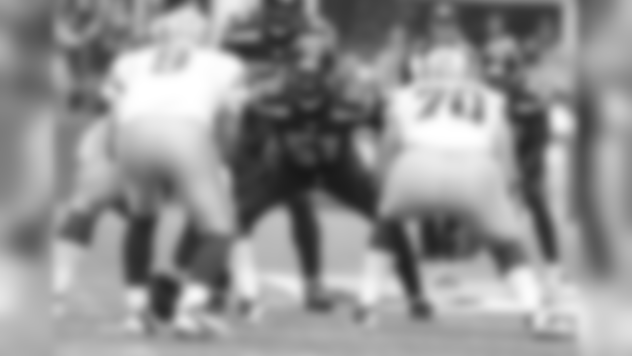 Seattle Seahawks linebacker Bruce Irvin (51) looks into the backfield during an NFL game against the Dallas Cowboys on Sunday, October 12, 2014. The Cowboys defeated the Seahawks 30-23 in Week 6. (AP Photo/Kevin Terrell)