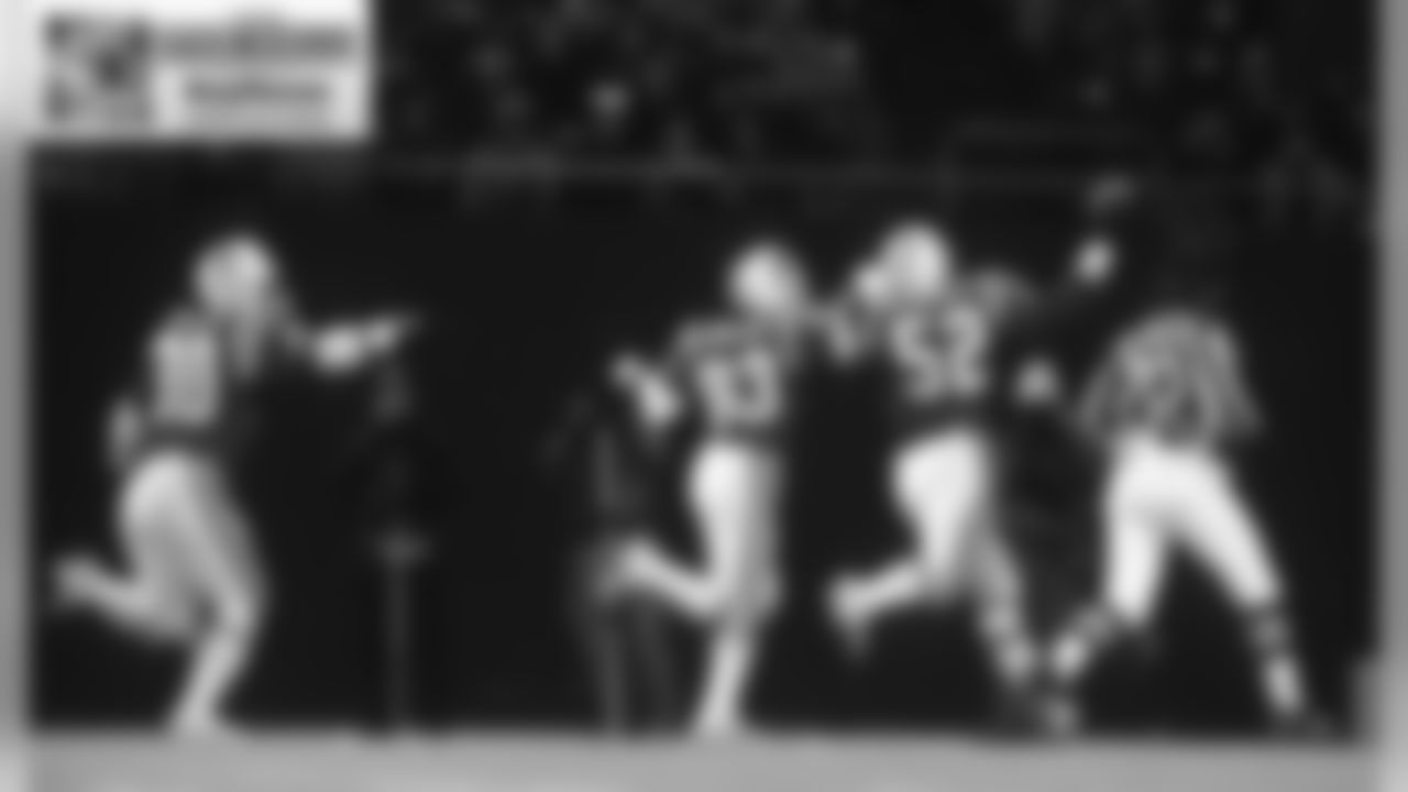 New England Patriots linebacker Johnny Rembert scores a touchdown on a 15-yard return of a fumble recovery during the Patriots 26-14 victory over the New York Jets in the 1985 AFC Wild Card Playoff Game on Dec. 28, 1985 at the Meadowlands in East Rutherford, New Jersey. (AP Photo/Vernon Biever)