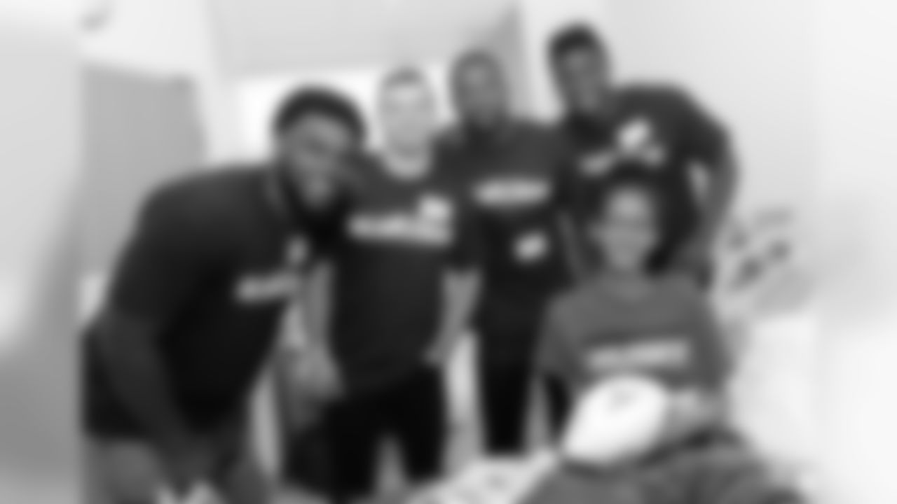 BOSTON, MA - JUNE 20: New England Patriot's rookies (L to R) Ja'Whaun Bentley, Braxton Berrios, Duke Dawson, and Christian Sam visit Kayah at Boston Children's Hospital June 20, 2018 in Boston, Massachusetts. (Photo by Darren McCollester/Getty Images for Boston Children's Hospital)
