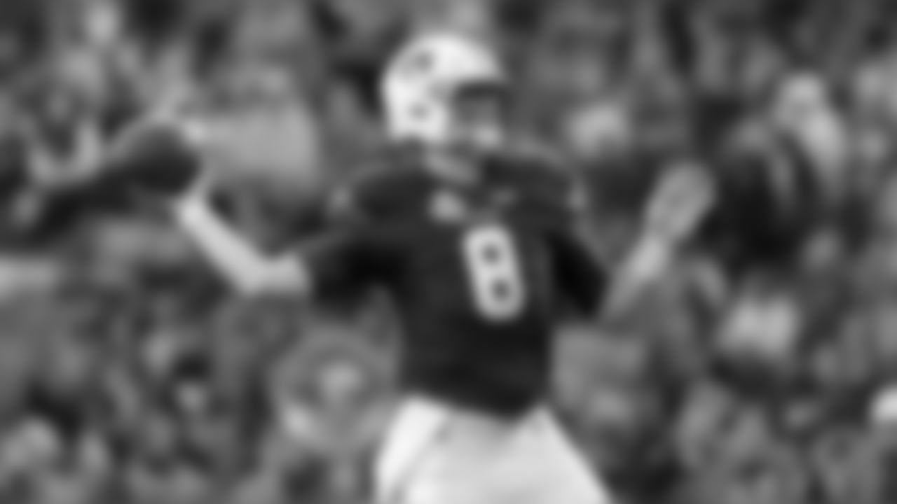 Auburn quarterback Jarrett Stidham (8) throws a touchdown pass against Liberty during the first half of an NCAA college football game, Saturday, Nov. 17, 2018, in Auburn, Ala.