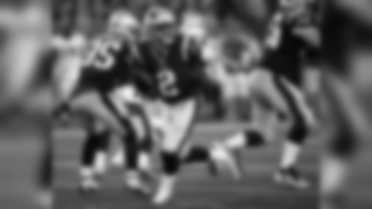 New England Patriots quarterback Brian Hoyer (2) rolls out to pass against the Philadelphia Eagles during the second half of a preseason NFL football game, Thursday, Aug. 16, 2018, in Foxborough, Mass. (AP Photo/Charles Krupa)