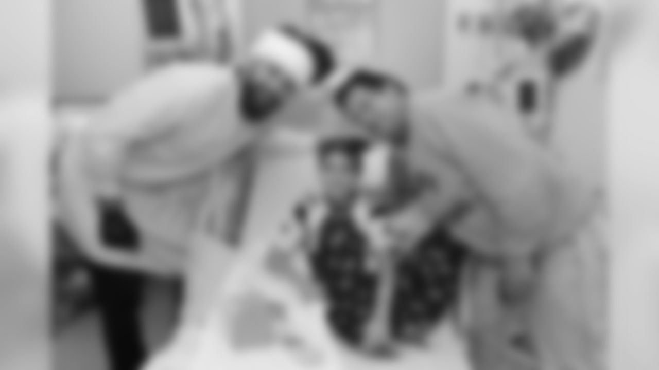 BOSTON, MA - DECEMBER 12: New England Patriot alumni Sebastian Vollmer visits with Mike and Dad at Boston Children's Hospital December 12, 2017 in Boston, Massachusetts. (Photo by Darren McCollester/Getty Images for Boston Children's Hospital)