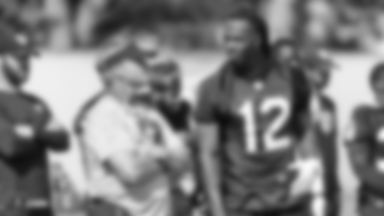 Oakland Raiders head coach Jon Gruden and wide receiver Martavis Bryant (12) on the field for practice at the Oakland Raiders Practice Facility, Monday, October 9, 2018, in Alameda, California.
