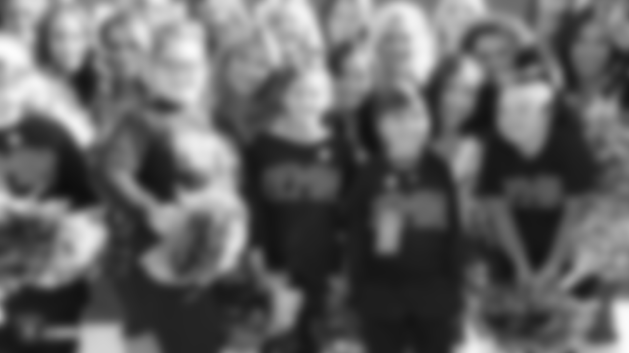 The Raiderettes with Nor-Cal Elite Team Gemini before the Oakland Raiders game against the Kansas City Chiefs at Oakland-Alameda County Coliseum, Sunday, December 2, 2018, in Alameda, California. The Oakland Raiders lost 40-33.
