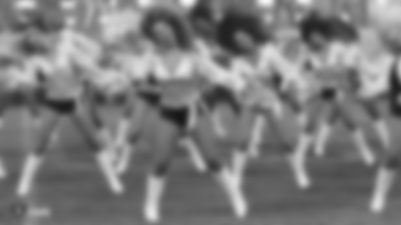 Pop singer Jess Glynne and the Raiderettes perform before The Oakland Raiders regular season game against the Seattle Seahawks at Wembley Stadium, Sunday, October 14, 2018, in London, England. The Oakland Raiders lost 27-3.
