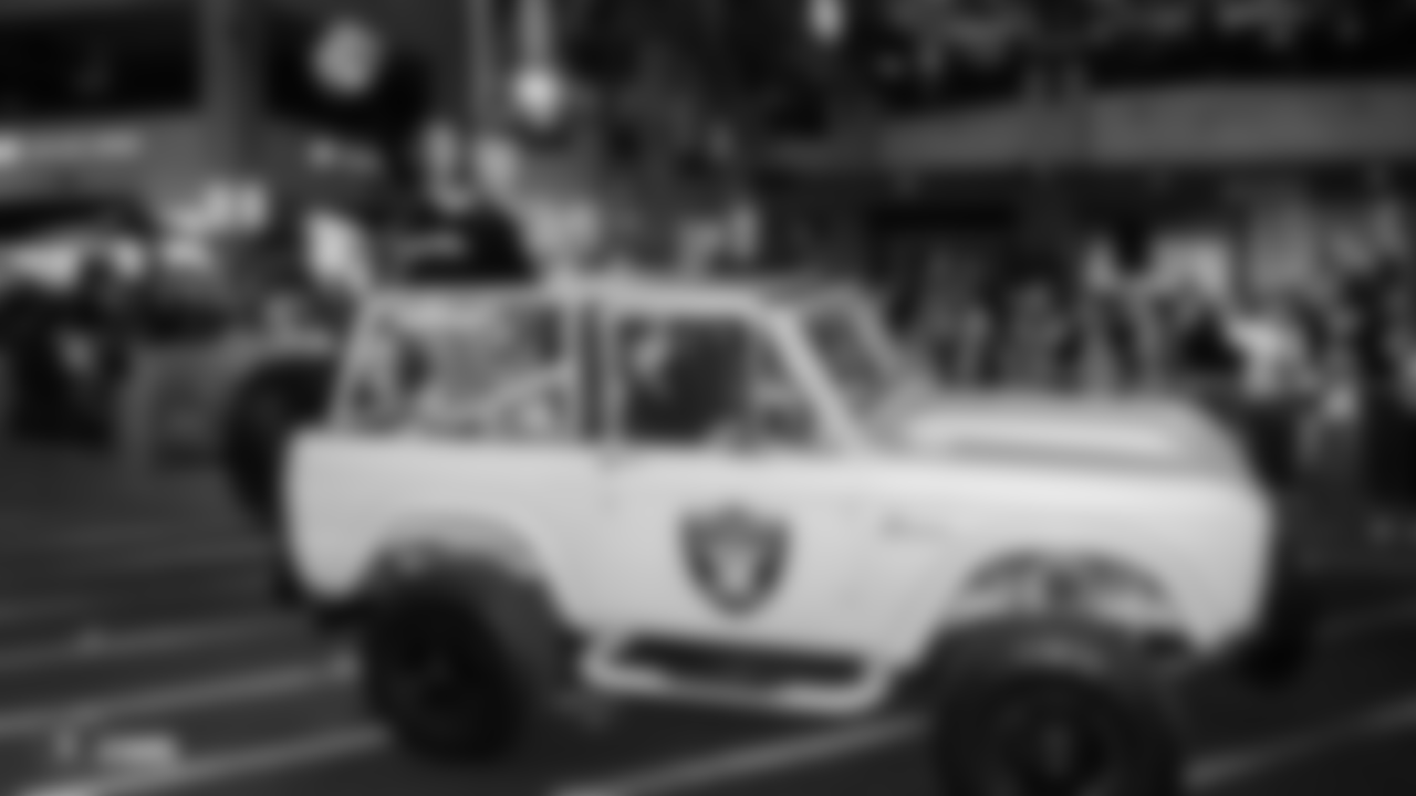 The Raiderettes are featured in the annual Holidays/Santa's Arrival Parade as they proceed in convertible cars through Town Square, Friday, November 16, 2018, in Las Vegas, Nevada.