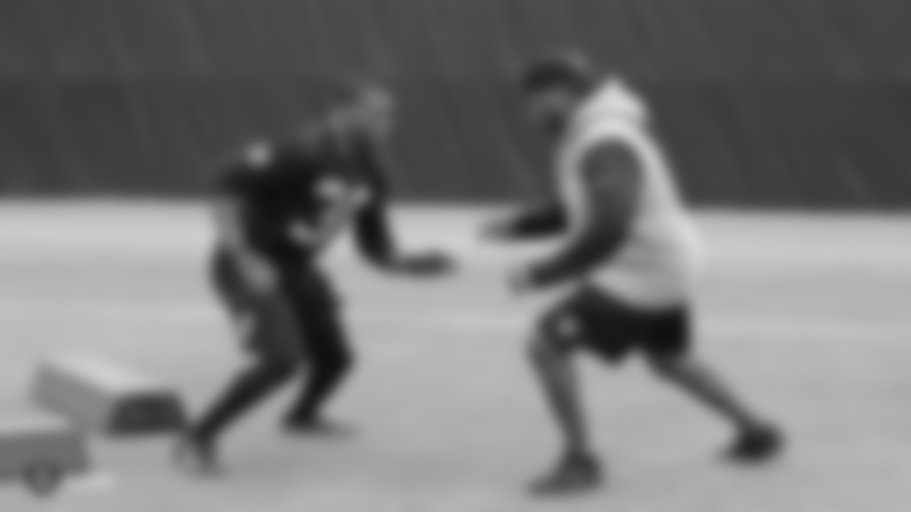 Raiders safety Jordan Richards (39) and assistant defensive backs coach Taver Johnson at a workout during phase two of the offseason program at the Raiders Practice Facility in Alameda, Calif.