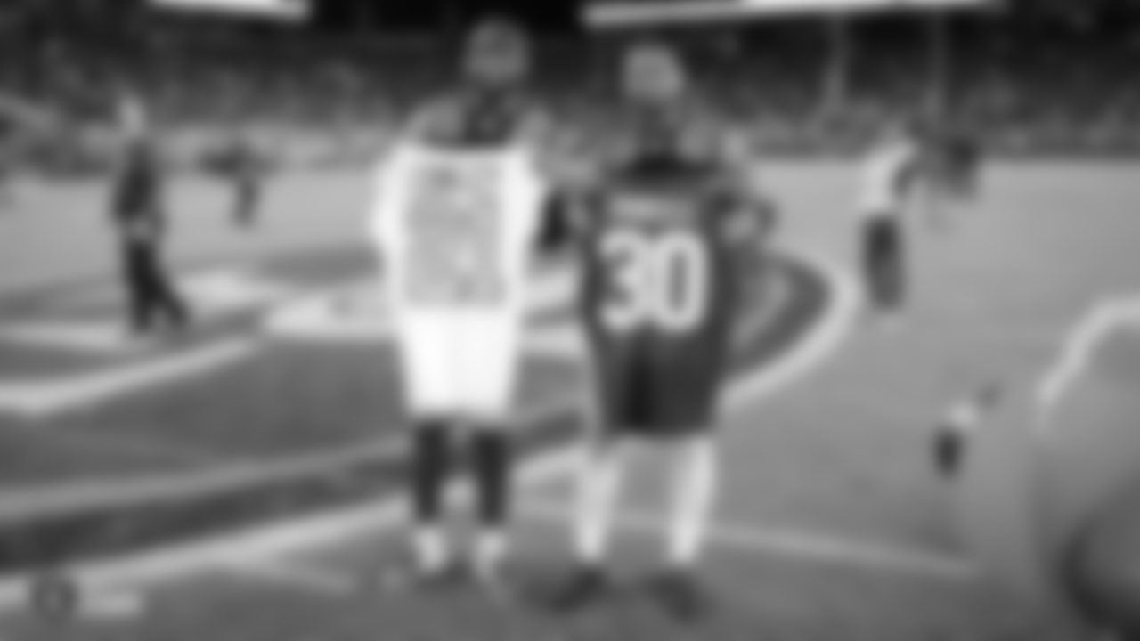 Oakland Raiders cornerback Gareon Conley (21) swaps jerseys with San Francisco 49ers defensive back Tyvis Powell (30) after The Oakland Raiders regular game against the San Francisco 49ers at Levi's Stadium, Thursday, November 1, 2018, in Santa Clara, California. The Oakland Raiders lost 34-3.