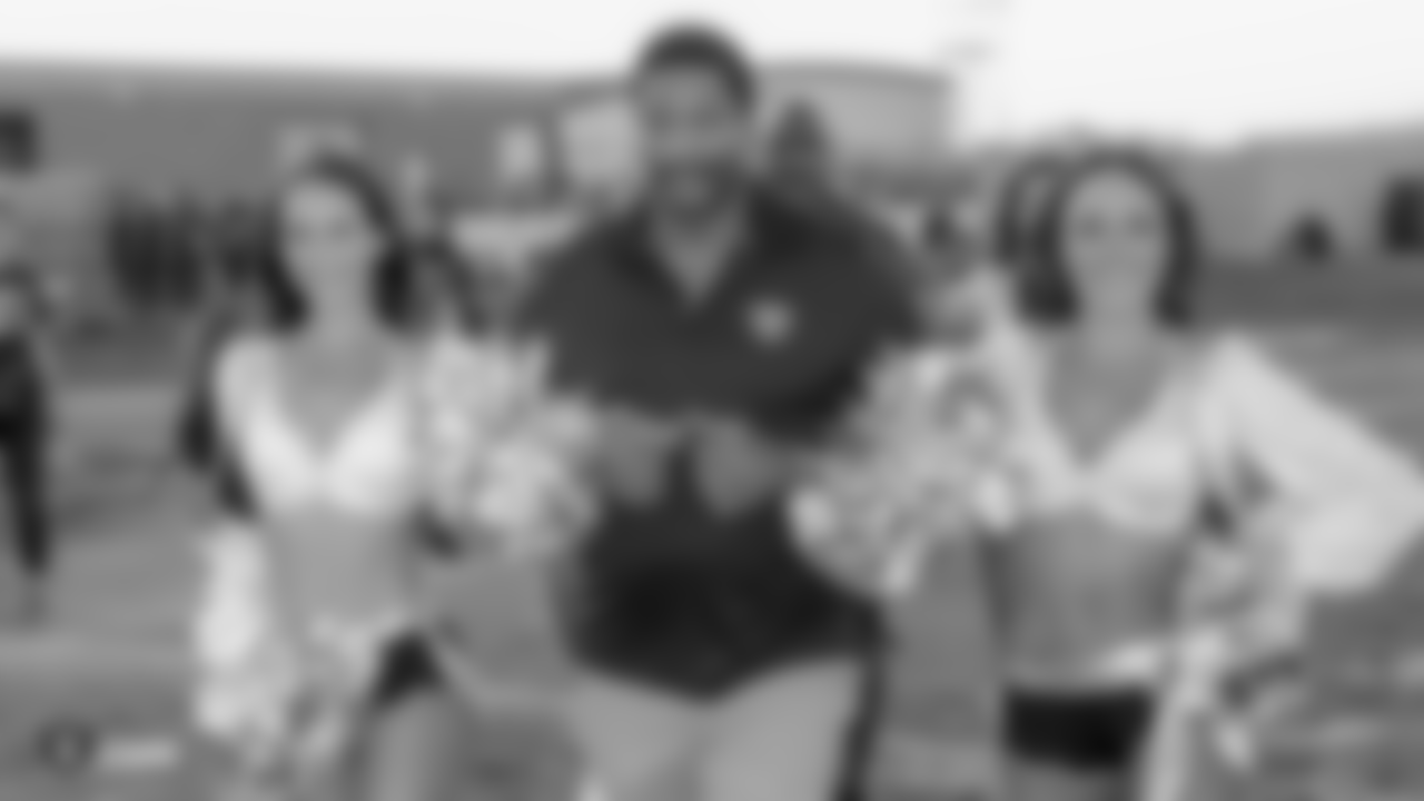 Oakland Raiders alumni and the Raiderettes visit Foothill High School to celebrate the kickoff of the Clark County School District high school 2018 football season, Friday, August 31, 2018, in Henderson, Nev.