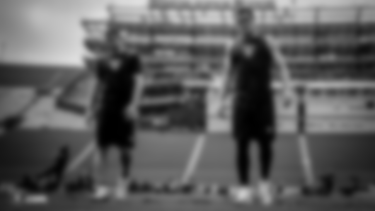 Oakland Raiders wide receiver Jordy Nelson (82) and quarterback Derek Carr (4) warming up before The Oakland Raiders preseason game against the Los Angeles Rams at Los Angeles Memorial Coliseum, Saturday, August 18, 2018, in Los Angeles, California. The Oakland Raiders lost 19-15.