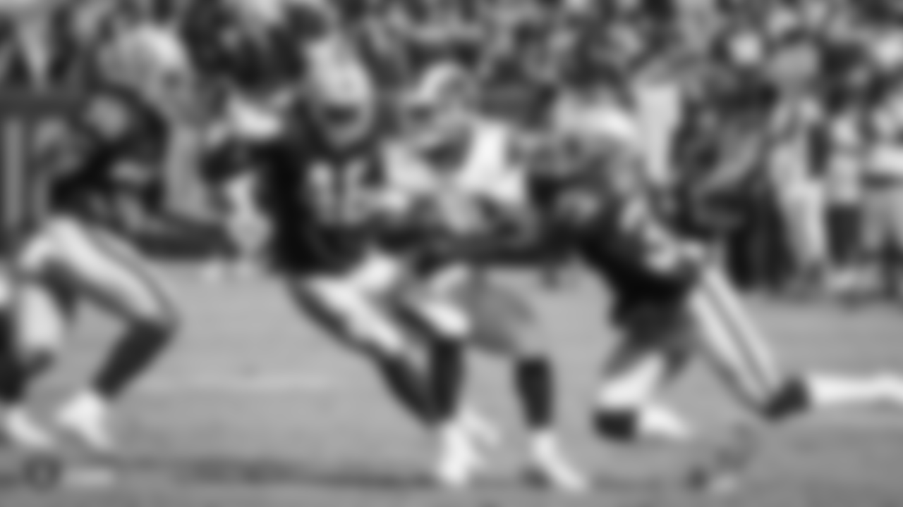 Oakland Raiders cornerback Nick Nelson (38), linebacker Jason Cabinda (46), and defensive back Tevin Mitchel (37) looks to make a tackle during The Oakland Raiders preseason game against the Los Angeles Rams at Los Angeles Memorial Coliseum, Saturday, August 18, 2018, in Los Angeles, California. The Oakland Raiders lost 19-15.
