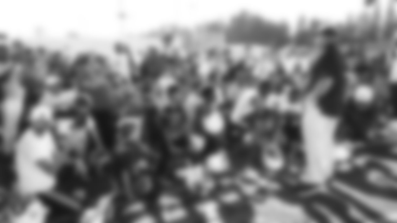 The Oakland Raiders head coach Jon Gruden presents a donation of football gear and checks for $50,000 by Dicks Sporting Goods Foundation's Sports Matters to both San Leandro Crusaders and East Bay Panthers' youth football teams. Accepting the donations were the San Leandro Crusaders' head coach Daniel Rivera and East Bay Panthers' head coach Jacob Davis, at Burrell Field, Tuesday, July 17, 2018, in San Leandro, California.