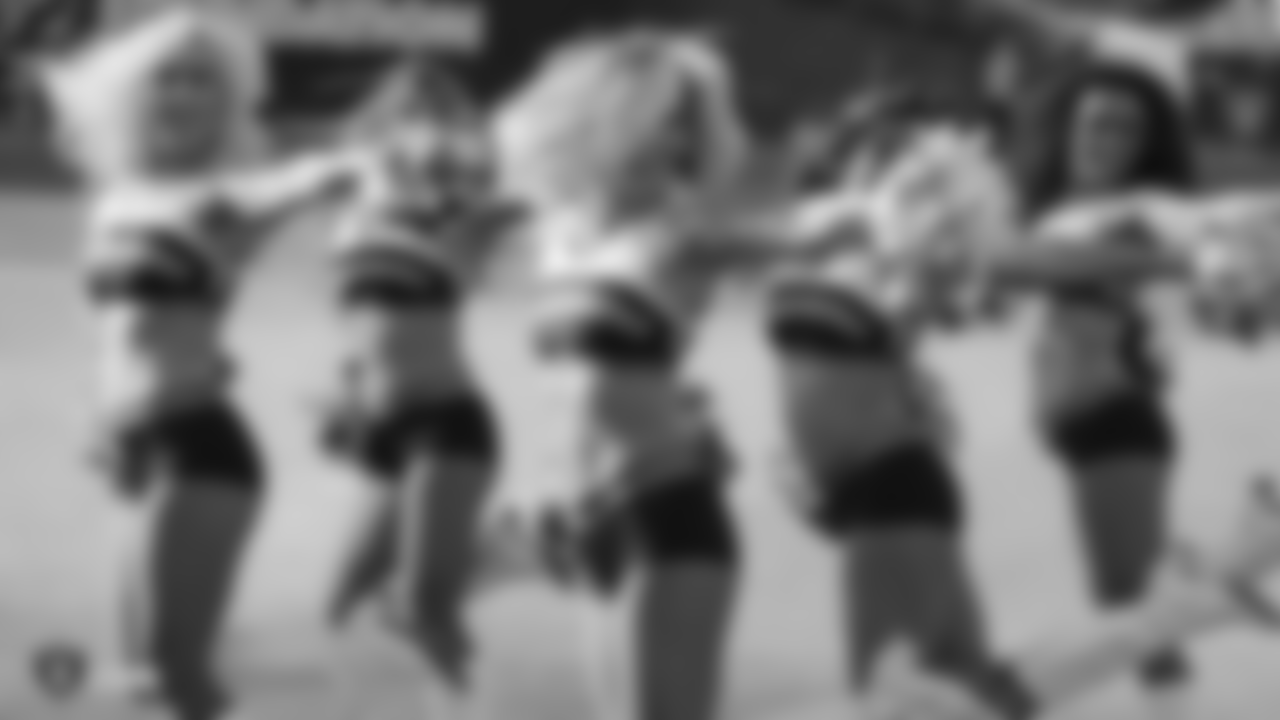 The Raiderettes warm up on the field before the Oakland Raiders game against the Cleveland Browns at Oakland-Alameda County Coliseum, Sunday, September 30, 2018, in Oakland, Calif. The Oakland Raiders won 45-42.