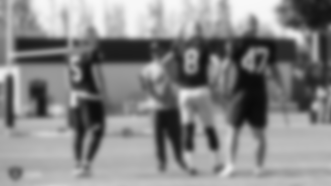 Oakland Raiders punter Johnny Townsend (5), assistant head coach and special teams coordinator Rich Bisaccia, kicker Daniel Carlson (8), long snapper Trent Sieg (47) on the field for practice at the Oakland Raiders Practice Facility, Friday, October 26, 2018, in Alameda, California.