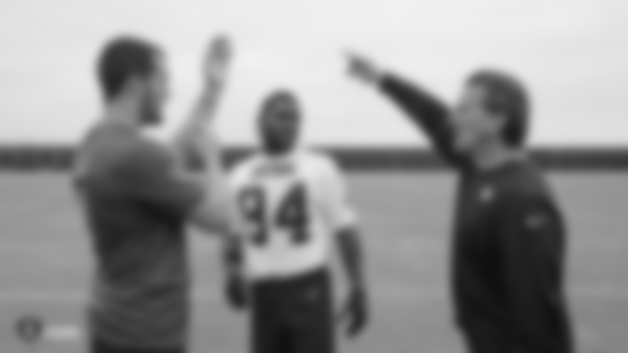 Raiders quarterback Derek Carr (4), wide receiver Antonio Brown (84), and offensive coordinator Greg Olson at a workout during phase two of the offseason program at the Raiders Practice Facility in Alameda, Calif.