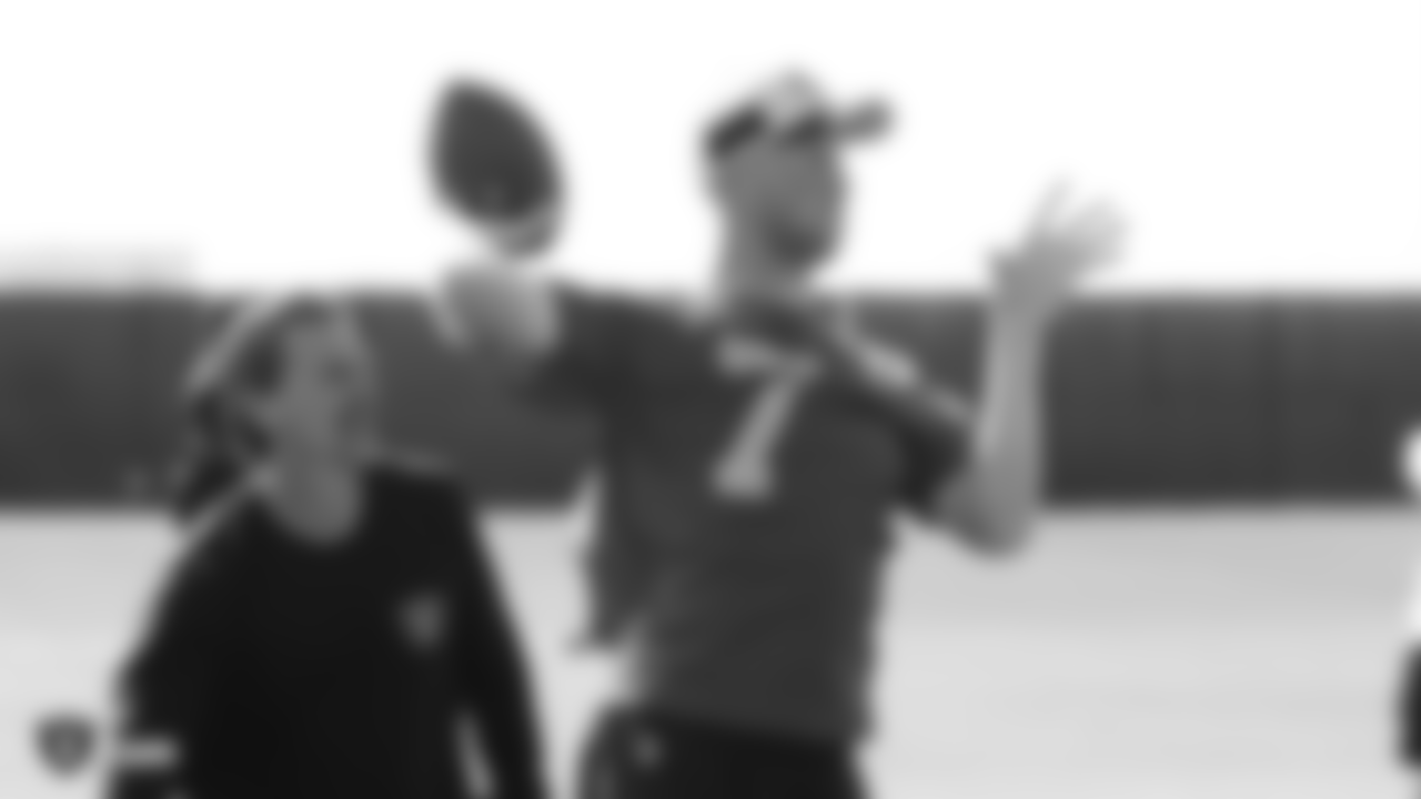 Raiders offensive coordinator Greg Olson and quarterback Mike Glennon at a workout during phase two of the offseason program at the Raiders Practice Facility in Alameda, Calif.