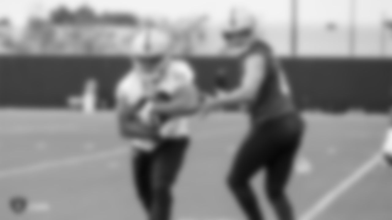 Raiders running back Doug Martin (22) and Derek Carr at an Organized Team Activity (OTA) at the Raiders Practice Facility in Alameda, Calif.