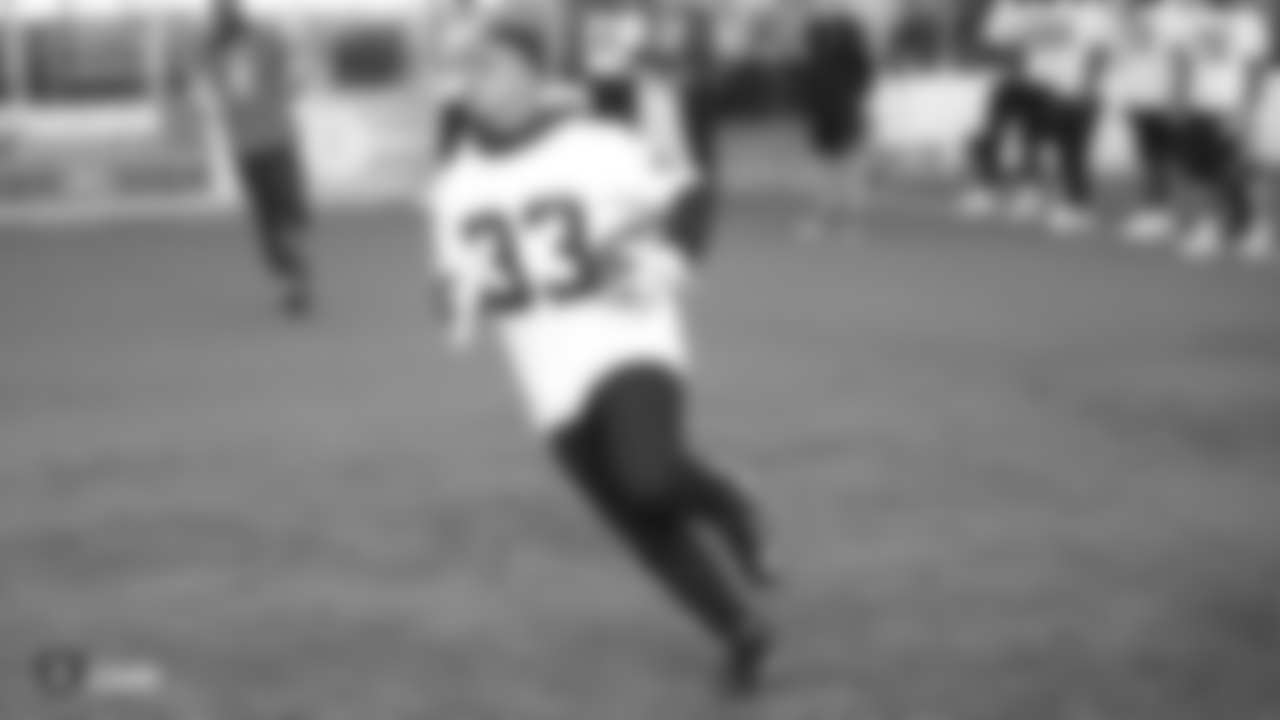 Oakland Raiders running back DeAndrŽ Washington (33) on the field for a walk through at Bladium Sports & Fitness, Thursday, November 15, 2018, in Alameda, California.
