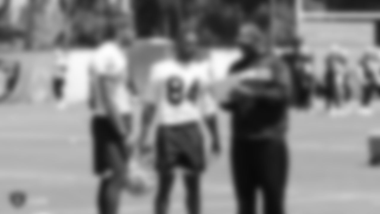Raiders wide receiver Tyrell Williams (16), wide receiver Antonio Brown (84), and wide receivers coach Edgar Bennett at an Organized Team Activity (OTA) at the Raiders Practice Facility in Alameda, Calif.