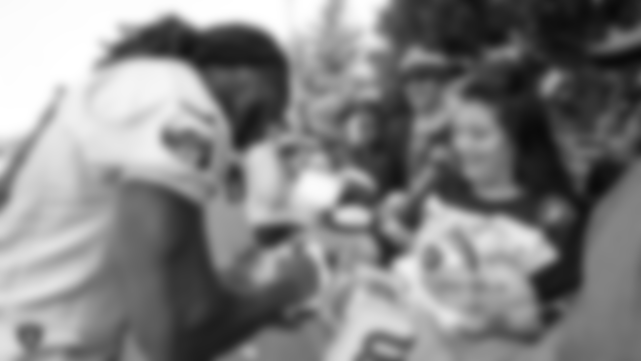 Oakland Raiders wide receiver Isaac Whitney (19) signs autographs for fans after practice at 2018 Training Camp at The Oakland Raiders Napa Valley Training Complex, Thursday, August 2, 2018, in Napa, California.