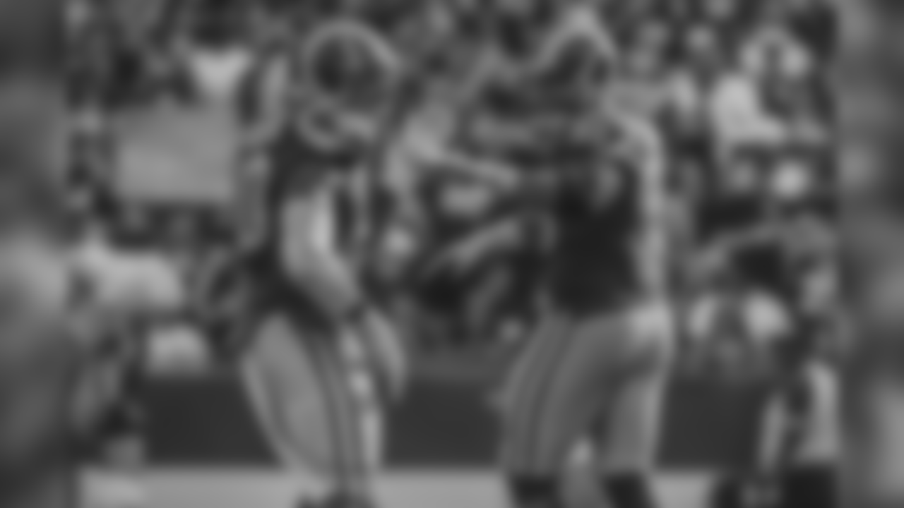 Los Angeles Rams defensive tackle Aaron Donald (99) and defensive tackle Michael Brockers (90) celebrate a sack during an NFL Football game against the Green Bay Packers, Sunday, Oct. 28, 2018, in Los Angeles. (Hiro Ueno/Rams)