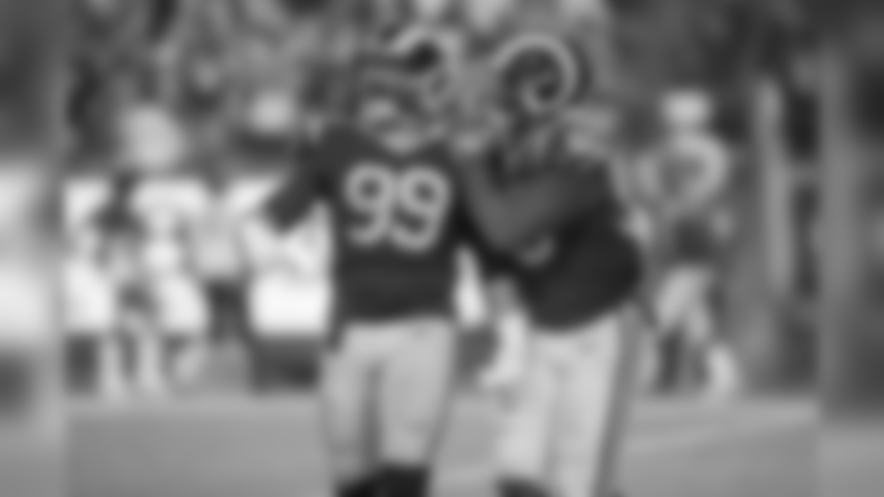Defensive tackle (99) Aaron Donald of the Los Angeles Rams celebrates with teammate (50) Samson Ebukam after a sack against the Minnesota Vikings during the Rams 38-31 victory over the Vikings in an NFL Week 4 Thursday Night Football game, Thursday, September 27, 2018, in Los Angeles, CA. (Jeff Lewis/Rams)
