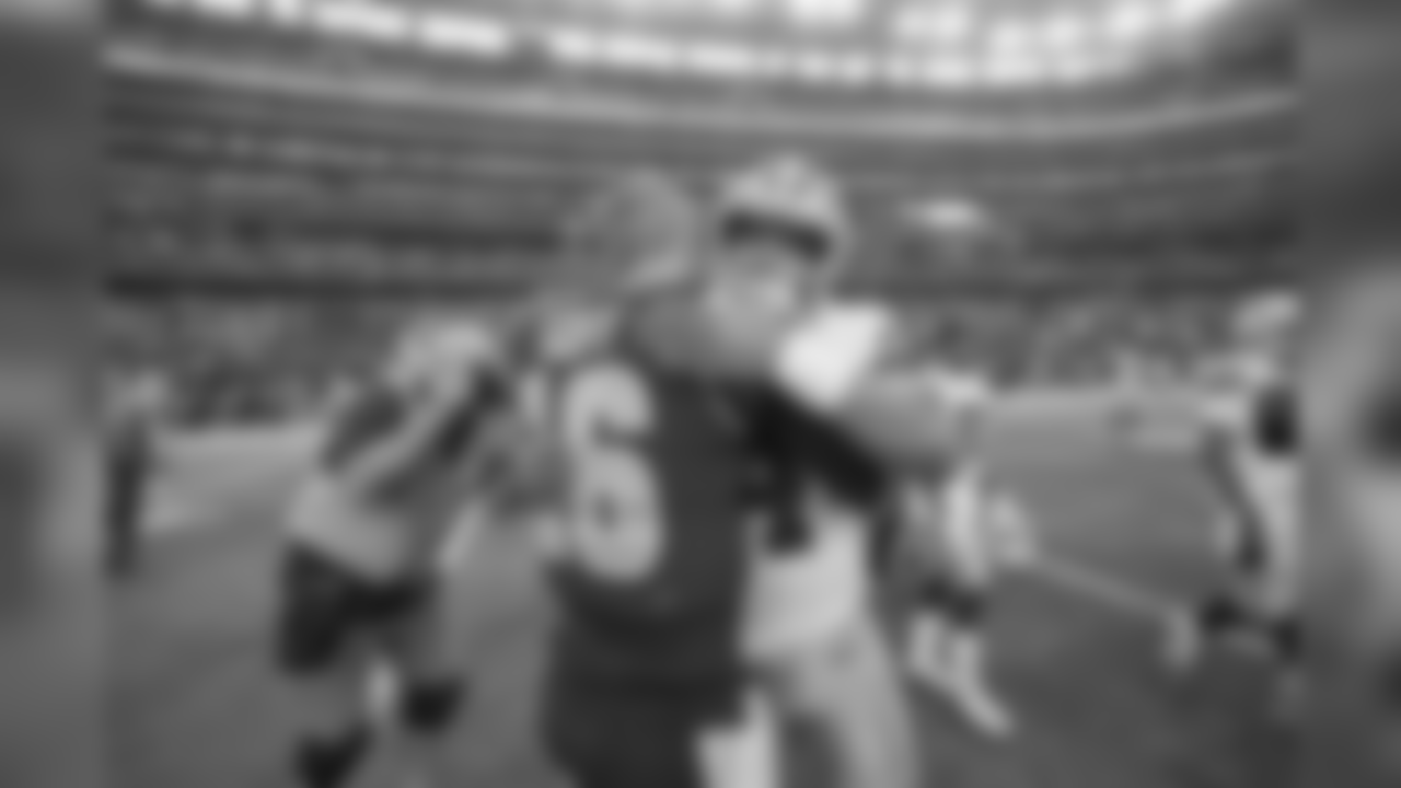 Quarterback (16) Jared Goff of the Los Angeles Rams hugs quarterback (4) Das Prescott of the Dallas Cowboys after the Rams 35-30 victory over the Cowboys in an NFL week 4 football game, Sunday, October 1, 2017, in Arlington TX. (Jeff Lewis/Rams)