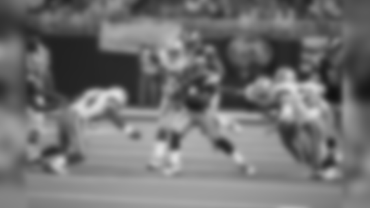 "St. Louis Rams Marshall Faulk runs for yardage against the Dallas Cowboys during a game on September 29, 2002 in St. Louis. The Cowboys won, 13-10. (Photo by Bill Stover/St. Louis Rams)"
