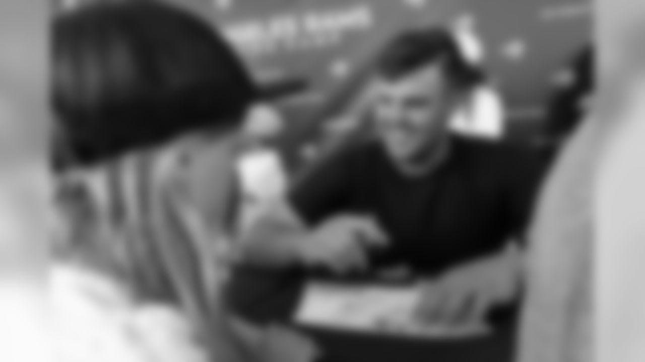 Center (66) Austin Blythe of the Los Angeles Rams signs autographs during Day 6 of Training Camp, Wednesday, August 01, 2018, in Irvine, CA. (Will Navarro/Rams)