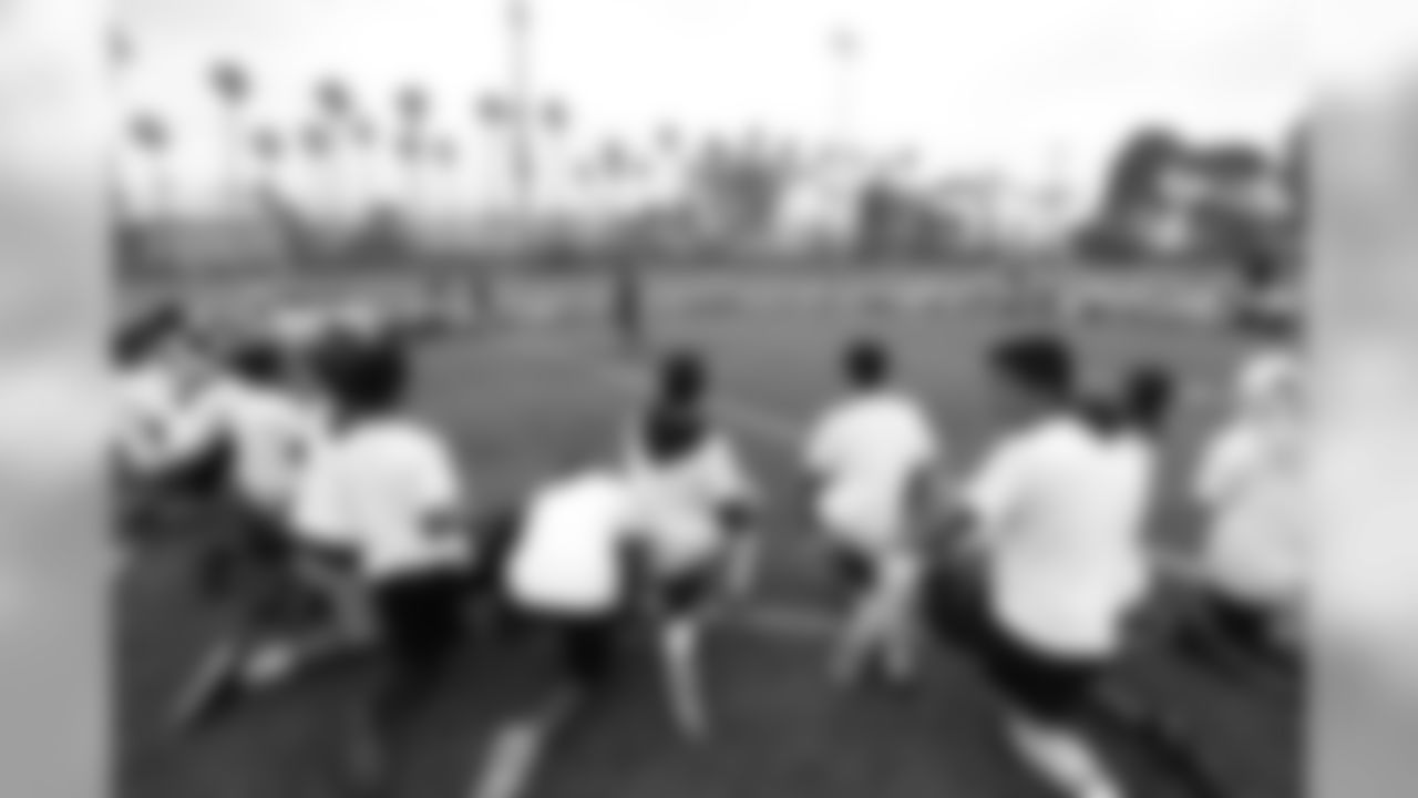 The Los Angeles Rams host Community Day in the City of Inglewood, alongside a co-ed Football Clinic for youth in learning football related drills and competitions while promoting safety, healthy and educational life skills. Certified USA Football coaches and Rams community members take the lead in todays activities. Attendees will have a chance to receive football gear owned by previous Rams players, football cleats, hats donated by the Rams. Saturday, June 1, 2019, Inglewood, CA. (Will Navarro/Rams)