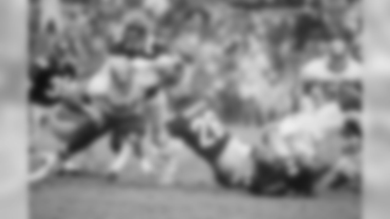 Preseason Week 3: At Atlanta Falcons
Washington Redskins defensive a tackle Tim Johnson (78) and a host of Atlanta Falcons guard Bill Fralic (79) and running back Pat Chaffey (28) watch the ball fly after Falcons running back Track Johnson fumbled during second quarter NFL Divisional playoff action, Saturday Jan. 4, 1992 at RFK stadium in Washington. (AP Photo/Joe Marquette)