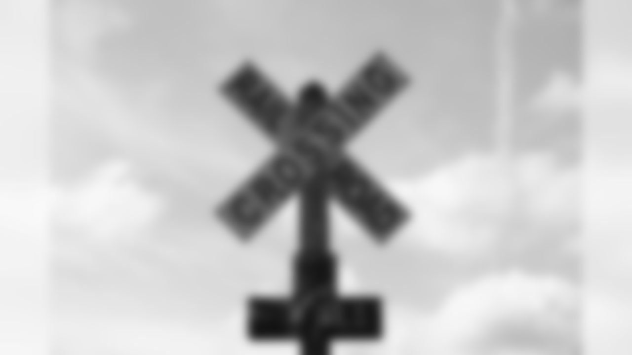 A detail view of a railroad crossing sign by the Southern Pacific railroad is seen in the hometown of New Orleans Saints punter Thomas Morstead in Pearland, Texas.