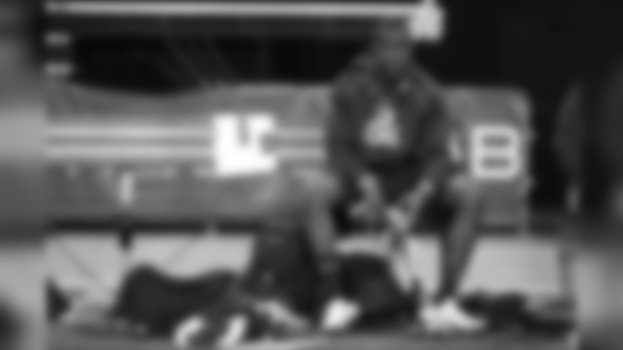 FILE - In this Feb. 23, 2014, file photo, Louisville quarterback Teddy Bridgewater sits on the bench at the NFL football scouting combine in Indianapolis. In 2014, quarterback Teddy Bridgewater decided not to throw in Indy then had a less-than-stellar Pro Day at Louisville. The result: A player thought to be in the running as the No. 1 overall pick was still available at the end of the first round. (AP Photo/Michael Conroy, File)
